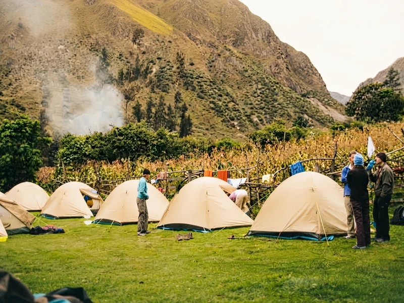 Camping tents set up in a mountain valley during the first night of the Inca Trail
