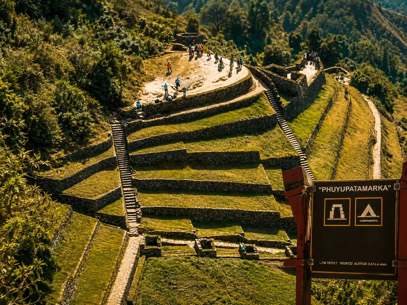 Inca terraces and stone structures at Phuyupatamarca overlooking the cloud forest