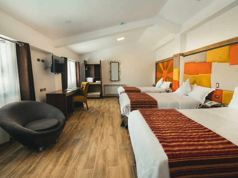Cómoda habitación de hotel en el centro histórico de Cusco para la aclimatación.