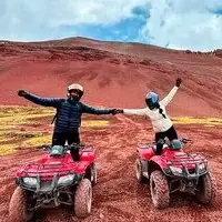 ATVs lined up on an Andean dirt track near Cusco
