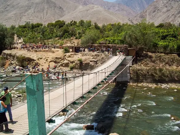 Hanging bridge over a river on the Salkantay route