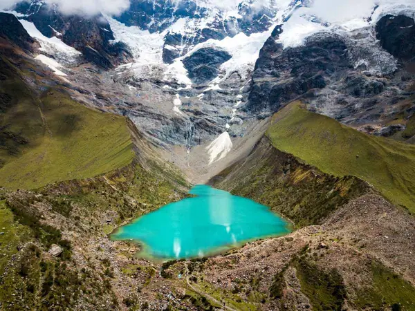 Humantay Lake surrounded by mountains in the Salkantay area