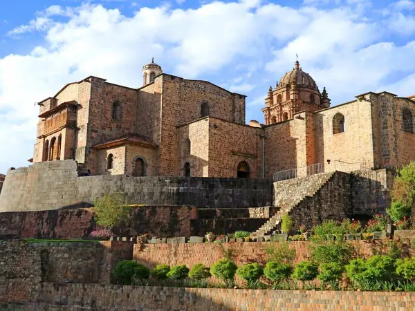 Qorikancha in Cusco: the colonial church and convent of Santo Domingo rising on top of fitted Inca stone walls and terraces